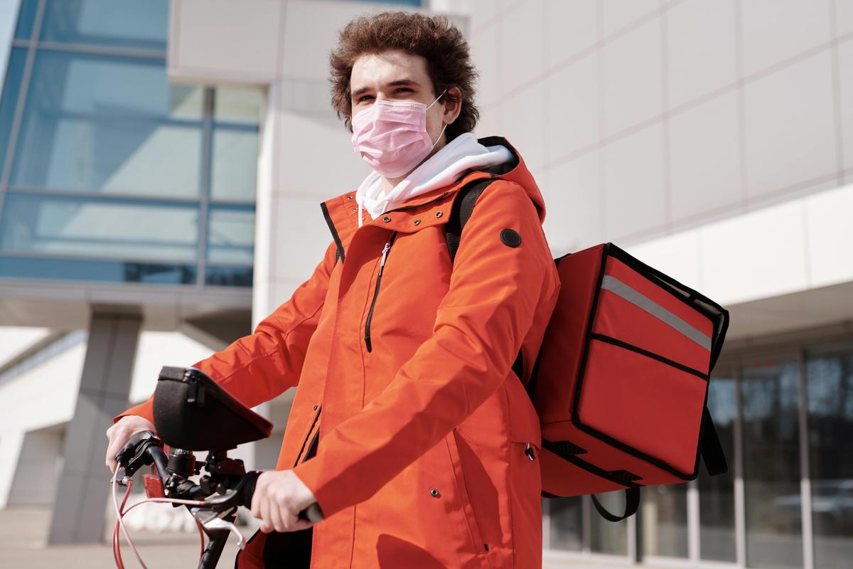 Delivery rider on motorcycle